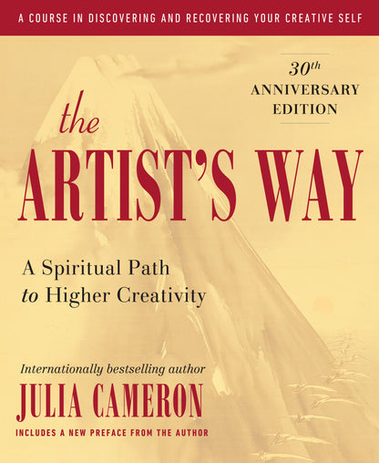 Book cover of 'The Artist's Way' with a blurred background