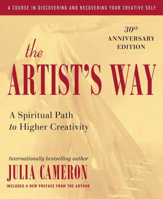 Book cover of 'The Artist's Way' with a blurred background