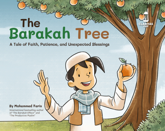 Boy holding orange in front of a tree